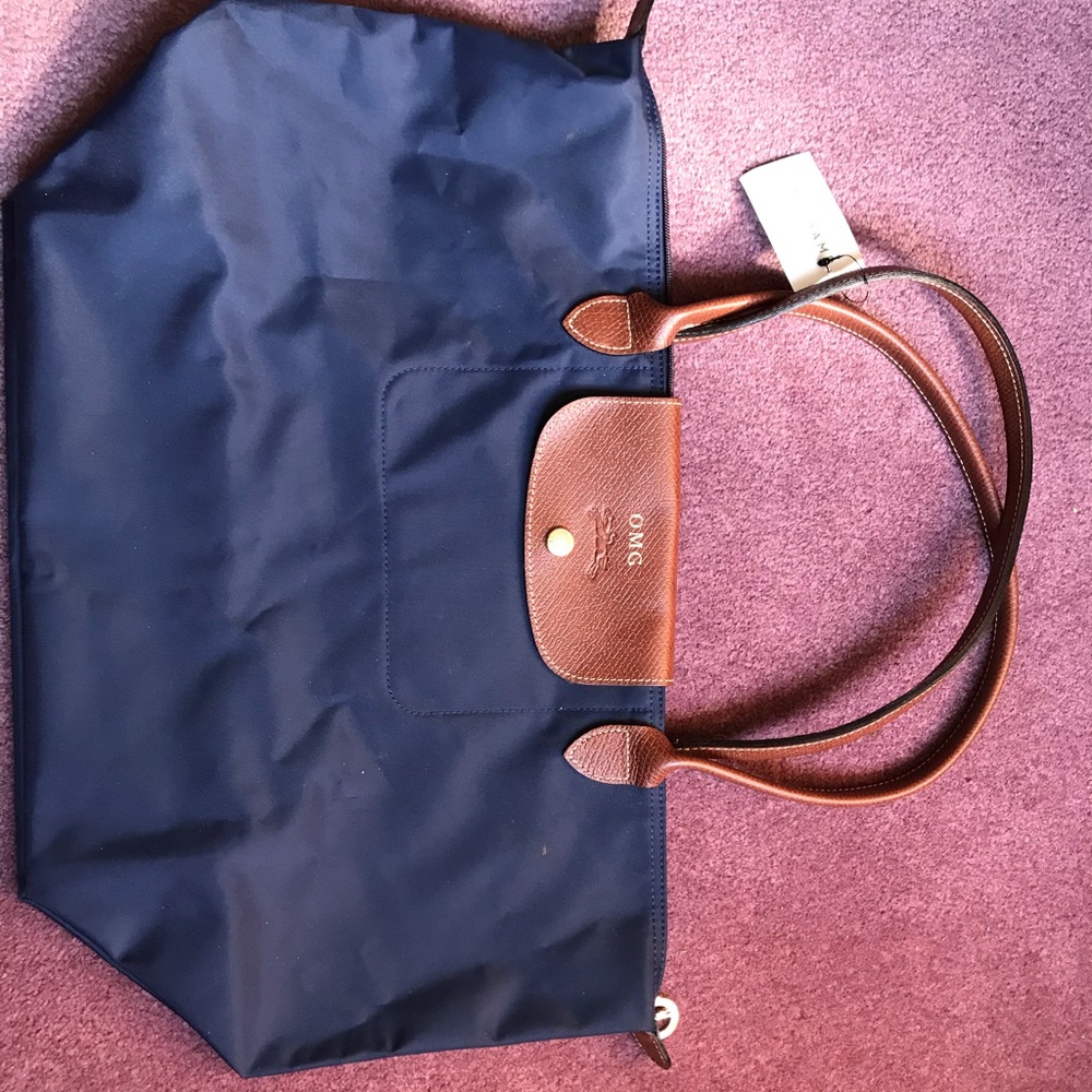 Longchamp navy bag brand new with tags and “omg”